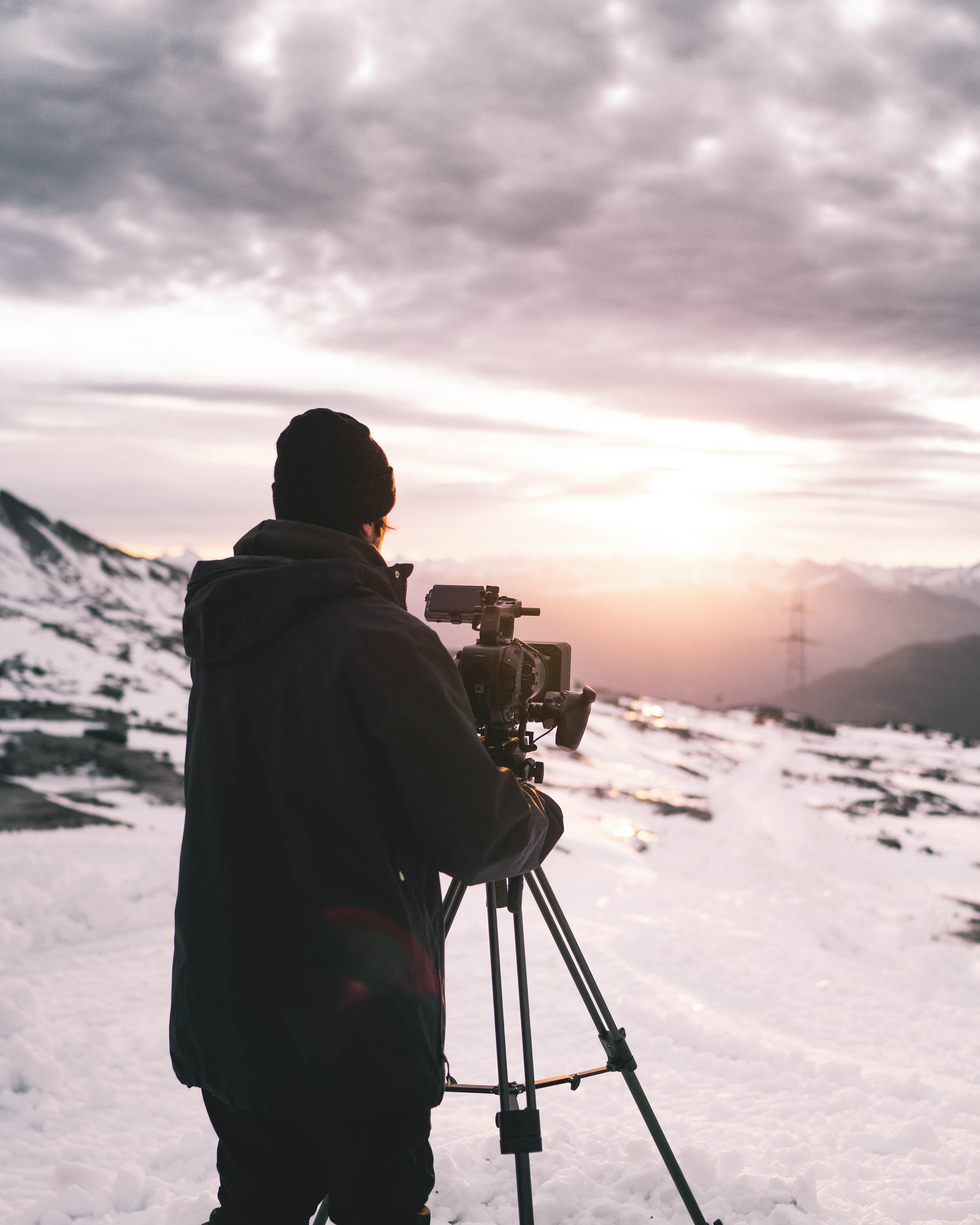 Mathias Wittwer filming during sunrise. Photo by Daniel Loosli